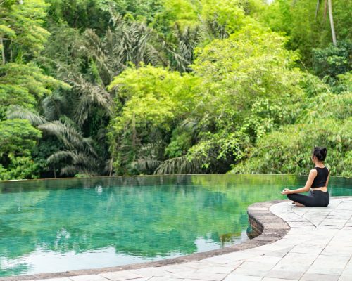 Serene Meditation by Infinity Pool in Nature
